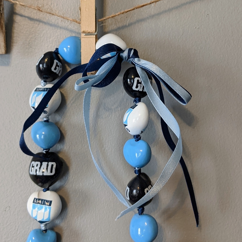University of Maine Graduation Kukiu Nut Lei